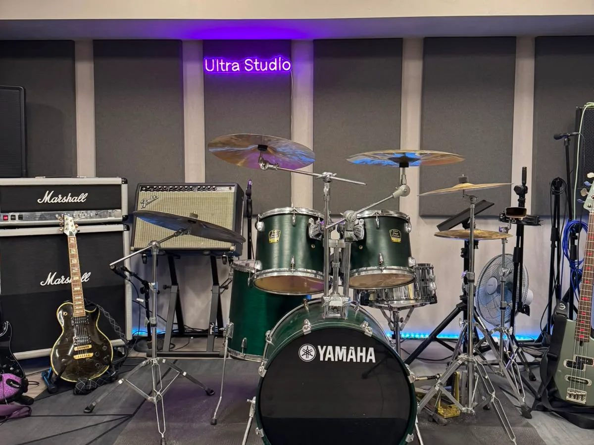 Acoustic wall panels and ceiling treatment installed at Ultra Studio, a commercial music rehearsal and recording space in Singapore
